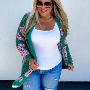 Vibrant Green and Pink Cardigan with Playful Design